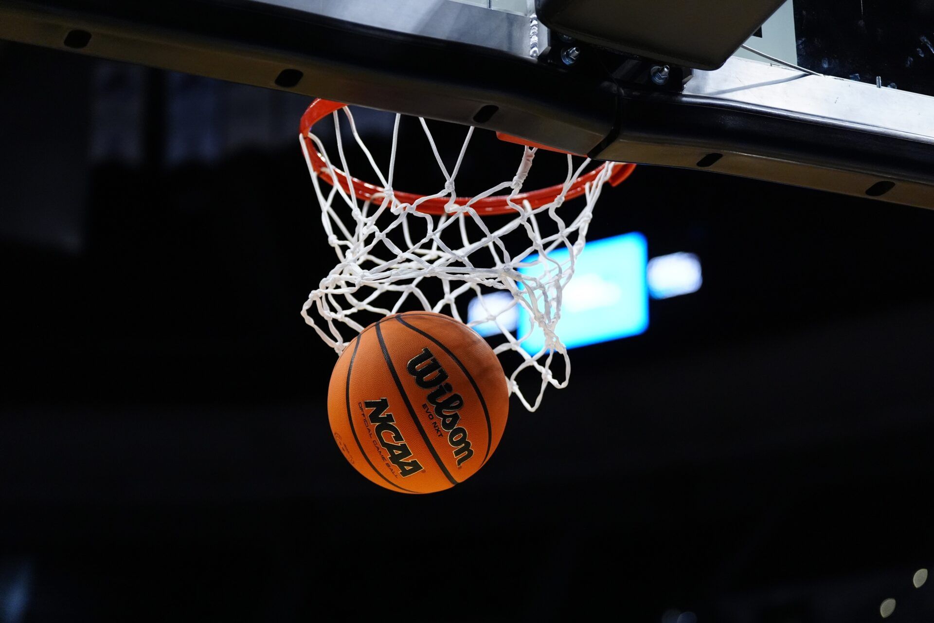 Detailed view of a Wilson NCAA basketball in the net during the against the Virginia Commonwealth Rams practice at Ball Arena.