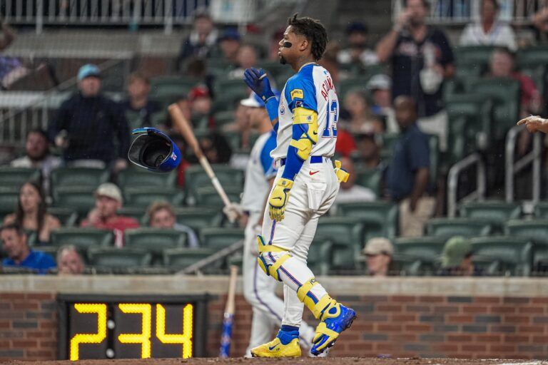 Atlanta Braves right fielder Ronald Acuna Jr (13) reacts after being called out on strikes against the Philadelphia Phillies during the sixth inning at Truist Park.