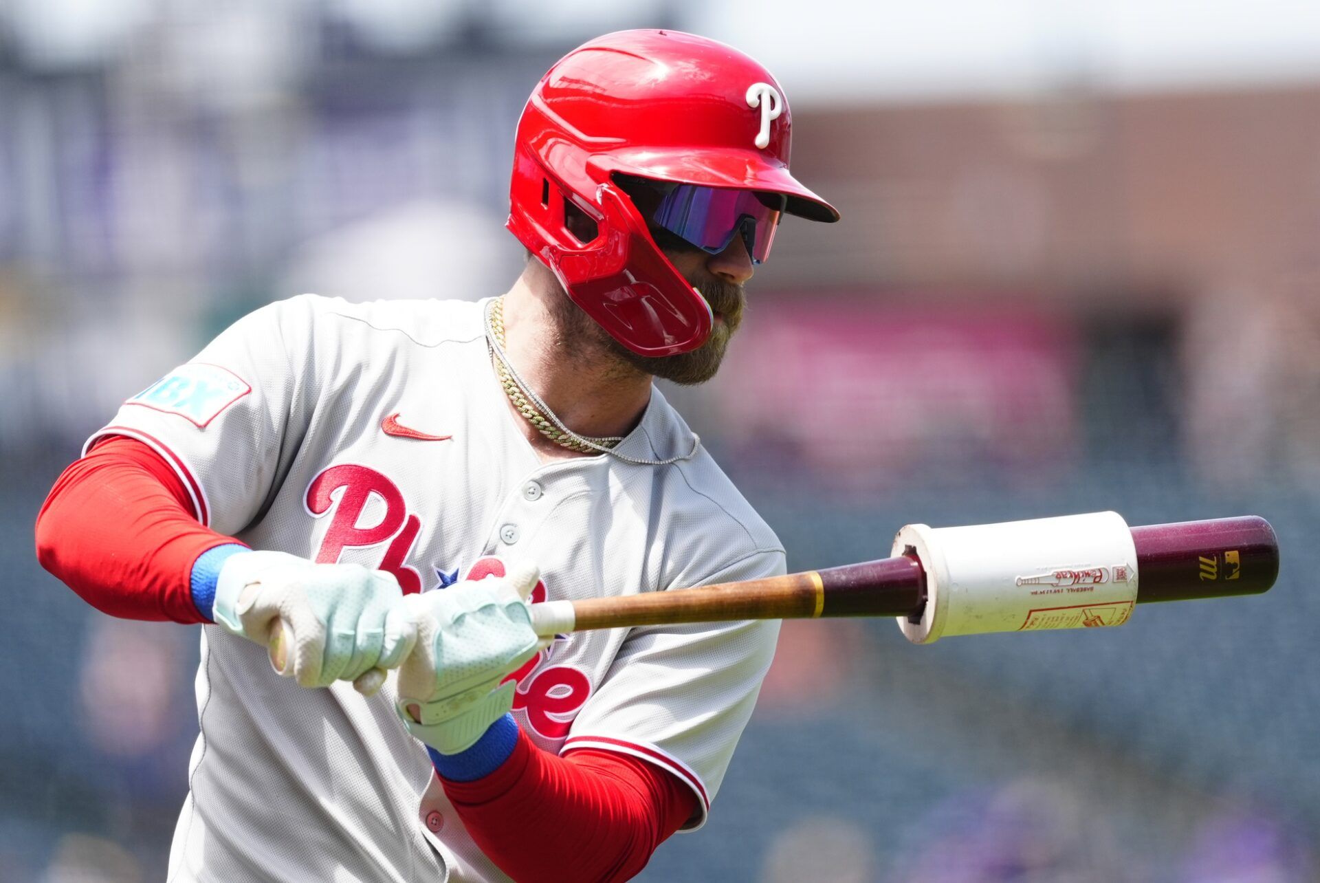 Philadelphia Phillies first baseman Bryce Harper (3) on deck to bat during the first inning against the Colorado Rockies at Coors Field.