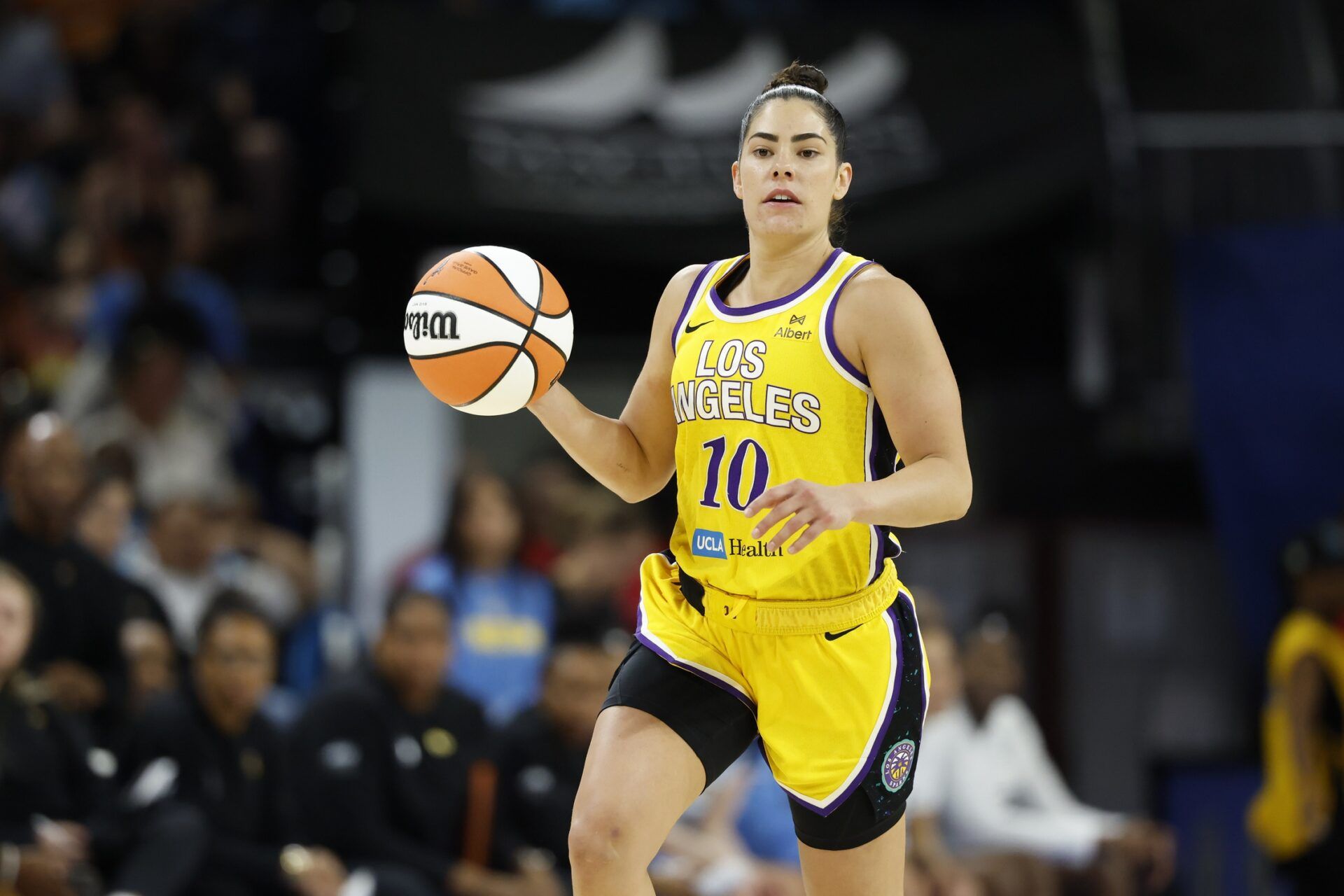 Los Angeles Sparks guard Kelsey Plum (10) brings the ball up court against the Chicago Sky during the second half at Wintrust Arena.