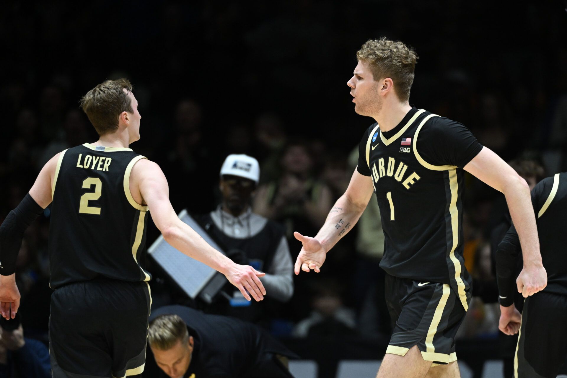 Purdue Boilermakers forward Caleb Furst (1) reacts against the Houston Cougars in the first half during a Midwest Regional semifinal of the 2025 NCAA tournament at Lucas Oil Stadium.