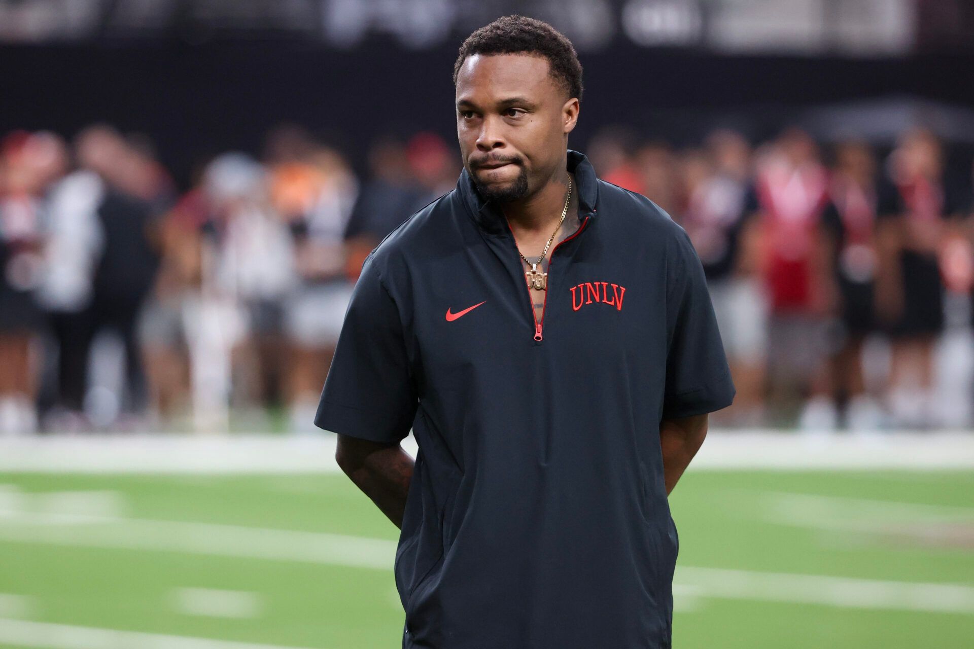 LAS VEGAS, NEVADA - OCTOBER 04: Offensive coordinator Brennan Marion of the UNLV Rebels looks on prior to a game against the Syracuse Orange at Allegiant Stadium on October 04, 2024 in Las Vegas, Nevada. (Photo by Ian Maule/Getty Images)