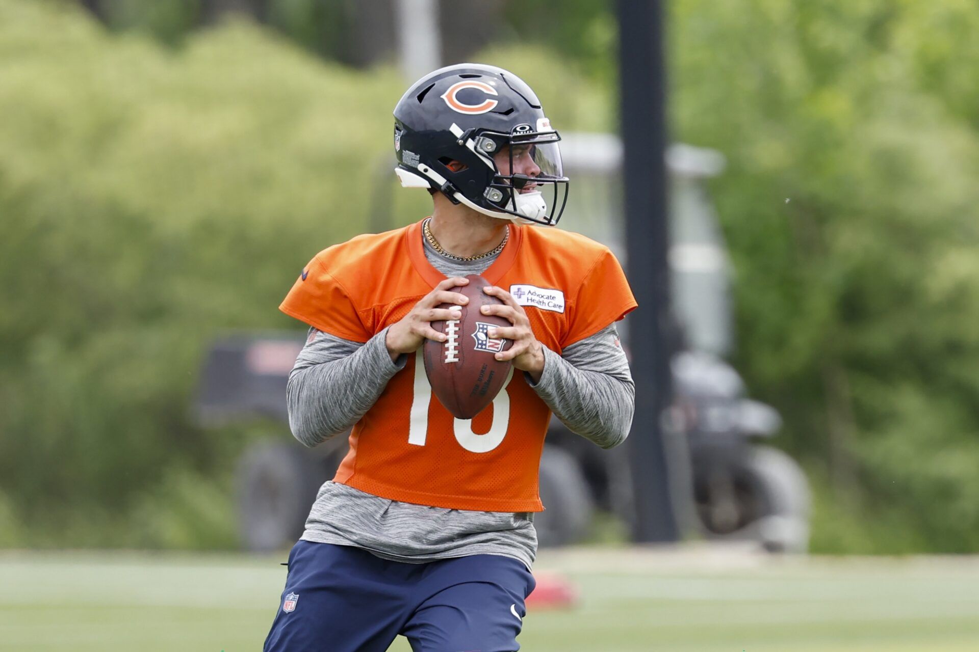 Chicago Bears quarterback Caleb Williams (18) looks to pass the ball during minicamp at Halas Hall.