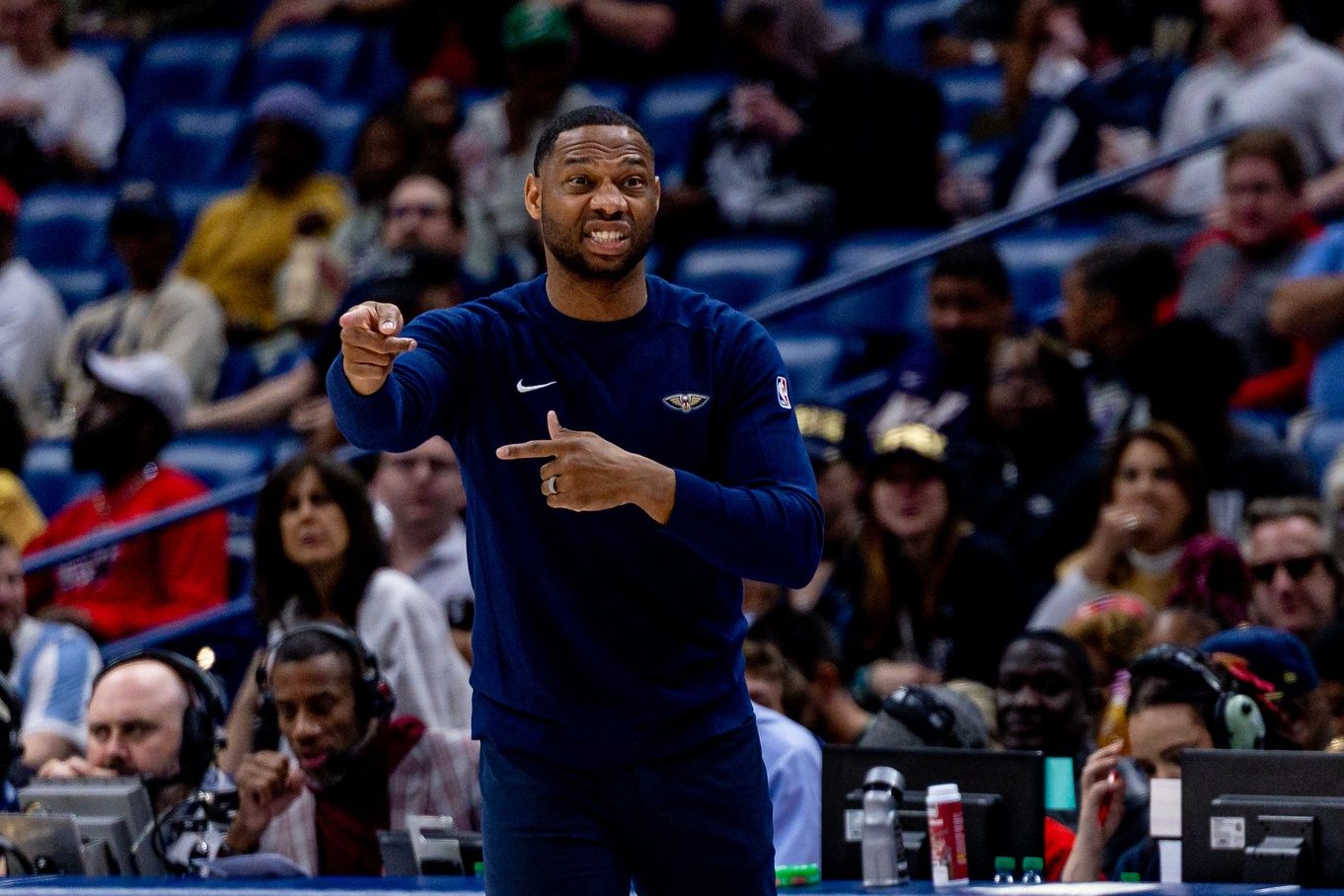 New Orleans Pelicans head coach Willie Green reacts to a play against the Orlando Magic during the first half at Smoothie King Center.
