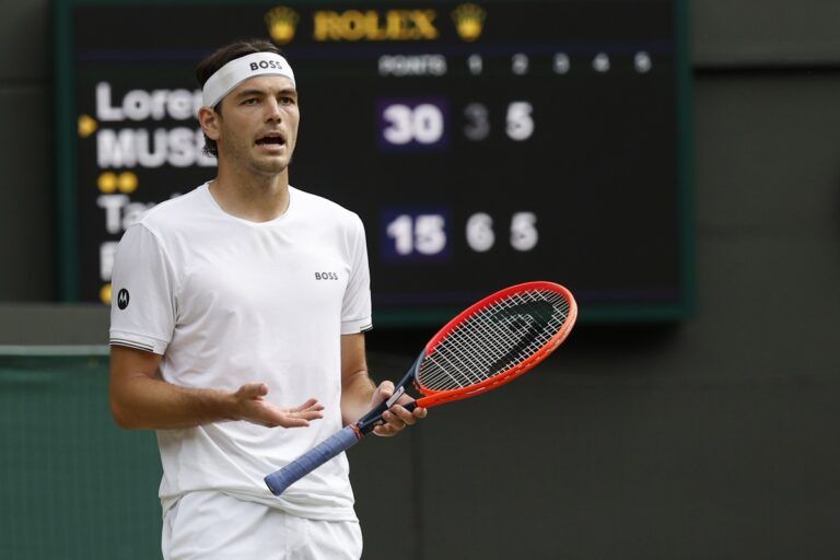 Taylor Fritz (USA) reacts after missing a shot against Lorenzo Musetti (ITA)(not pictured) in a gentlemen's singles quarter final match of The Championships Wimbledon 2024 at The All England Lawn Tennis Club.