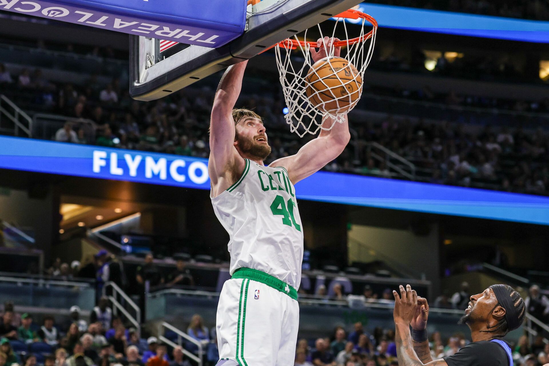 Boston Celtics center Luke Kornet (40) dunks during the first quarter against the Orlando Magic at Kia Center.
