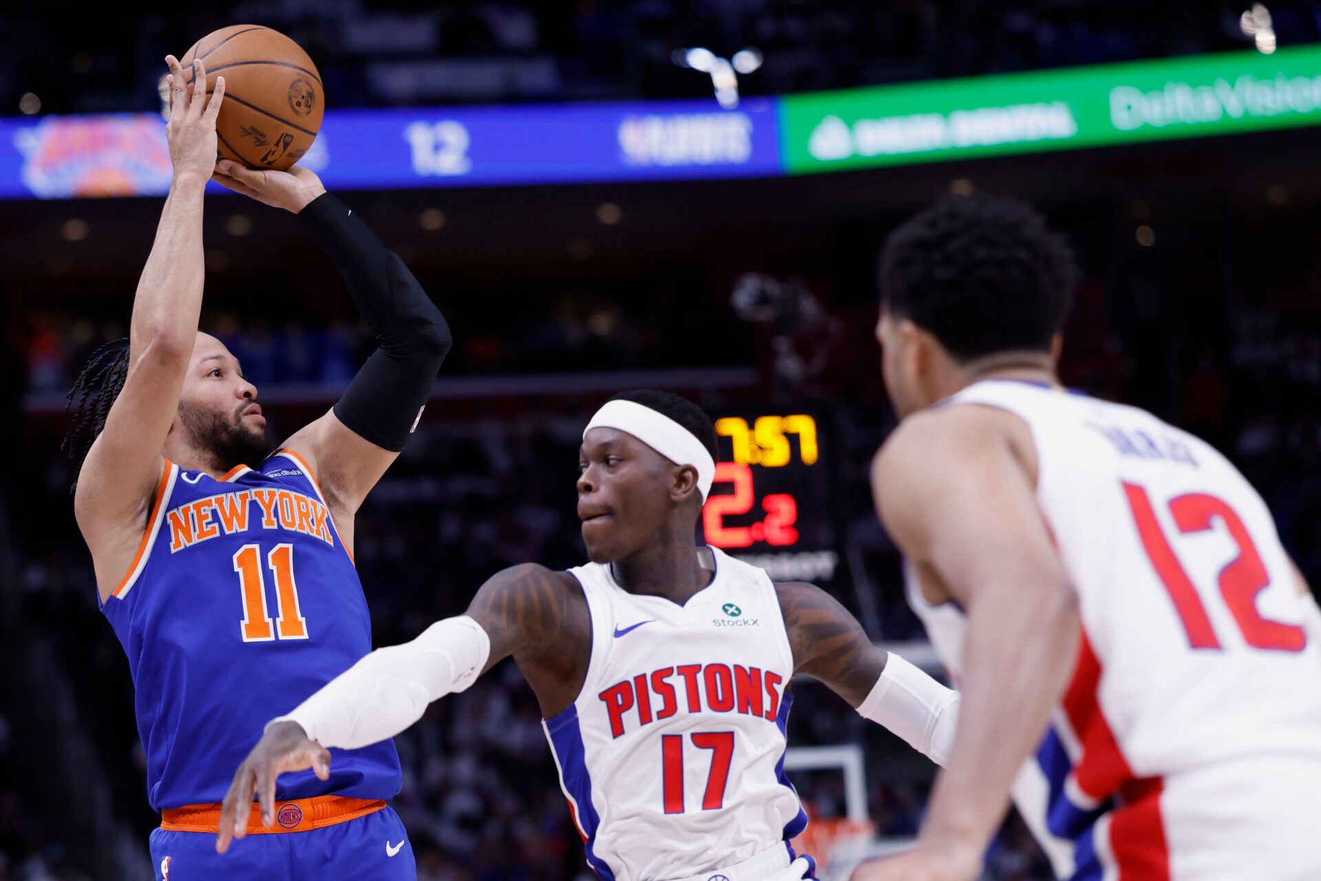 New York Knicks guard Jalen Brunson (11) shoots on Detroit Pistons guard Dennis Schroder (17) in the first half during game six of first round for the 2024 NBA Playoffs at Little Caesars Arena.