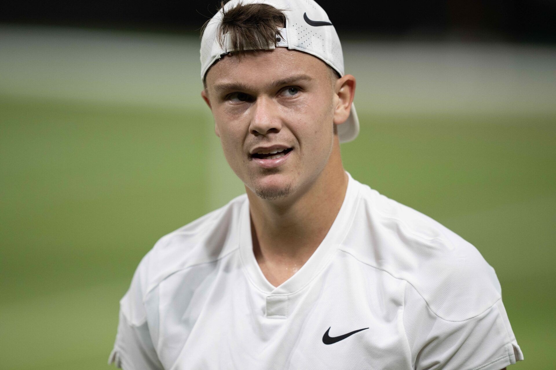 Holger Rune of Denmark during his match against Novak Djokovic of Serbia (not shown) on day eight of The Championships at All England Lawn Tennis and Croquet Club.