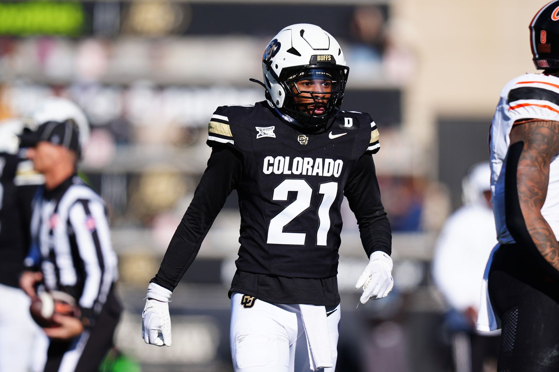 Colorado Buffaloes safety Shilo Sanders (21) reacts in the second quarter against the Oklahoma State Cowboys at Folsom Field.
