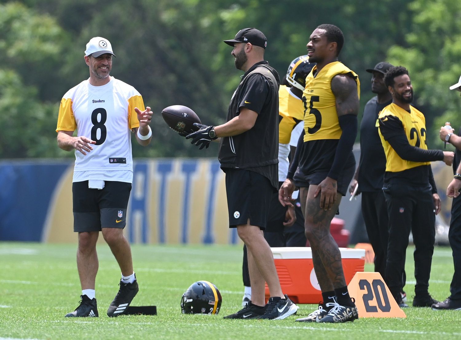 Pittsburgh Steelers quarterback Aaron Rodgers (8) gets the ball during minicamp at their South Side facility.