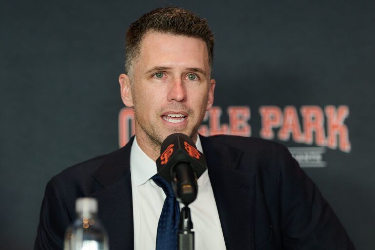 San Francisco Giants president of baseball operations Buster Posey speaks during the introductory press conference for shortstop Willy Adames (not pictured) at Oracle Park.