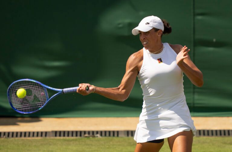 Madison Keys of the United States returns a shot during her match against Elena-Gabriela Ruse of Romania on day one at the All England Lawn Tennis and Croquet Club.