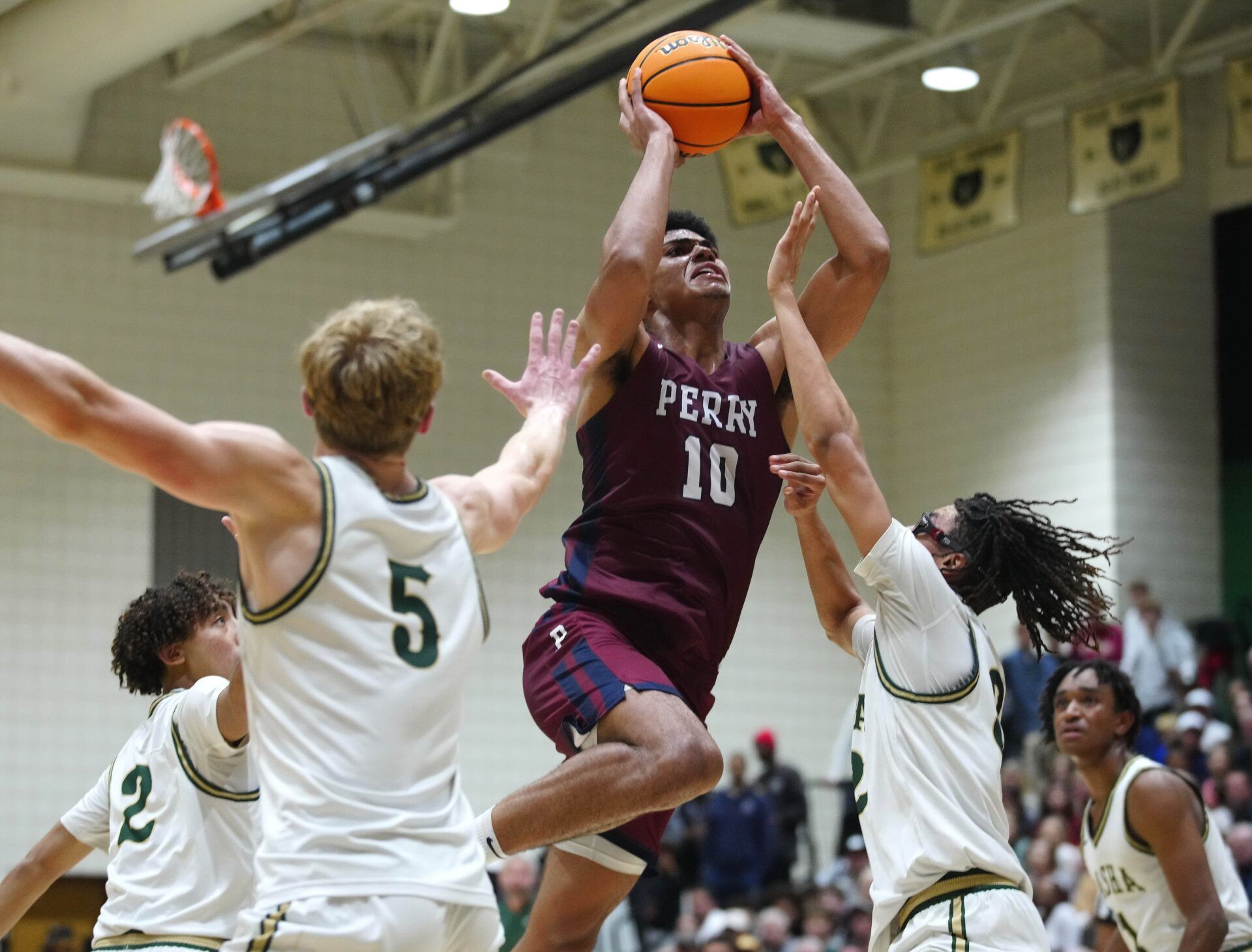 USA; Perry forward Koa Peat (10) shoots against Basha during the a game at Basha High School.