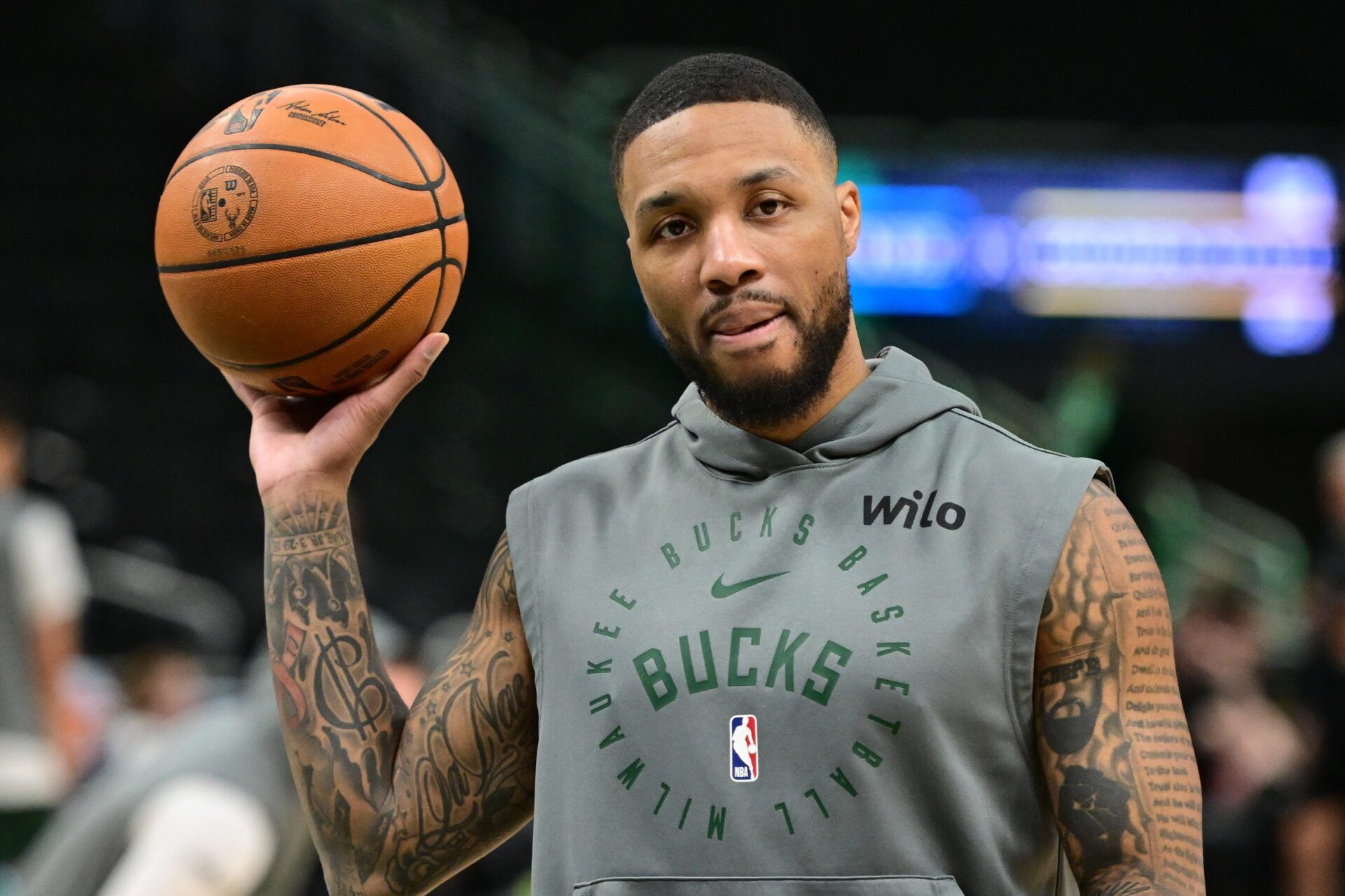 Milwaukee Bucks guard Damian Lillard (0) warms up before game against the Golden State Warriors at Fiserv Forum.