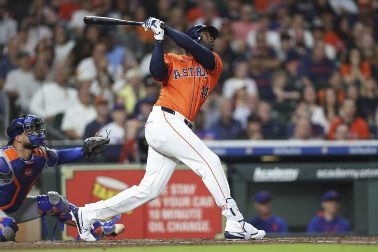 Houston Astros designated hitter Yordan Alvarez (44) hits an RBI sacrifice fly during the fourth inning against the New York Mets at Daikin Park.