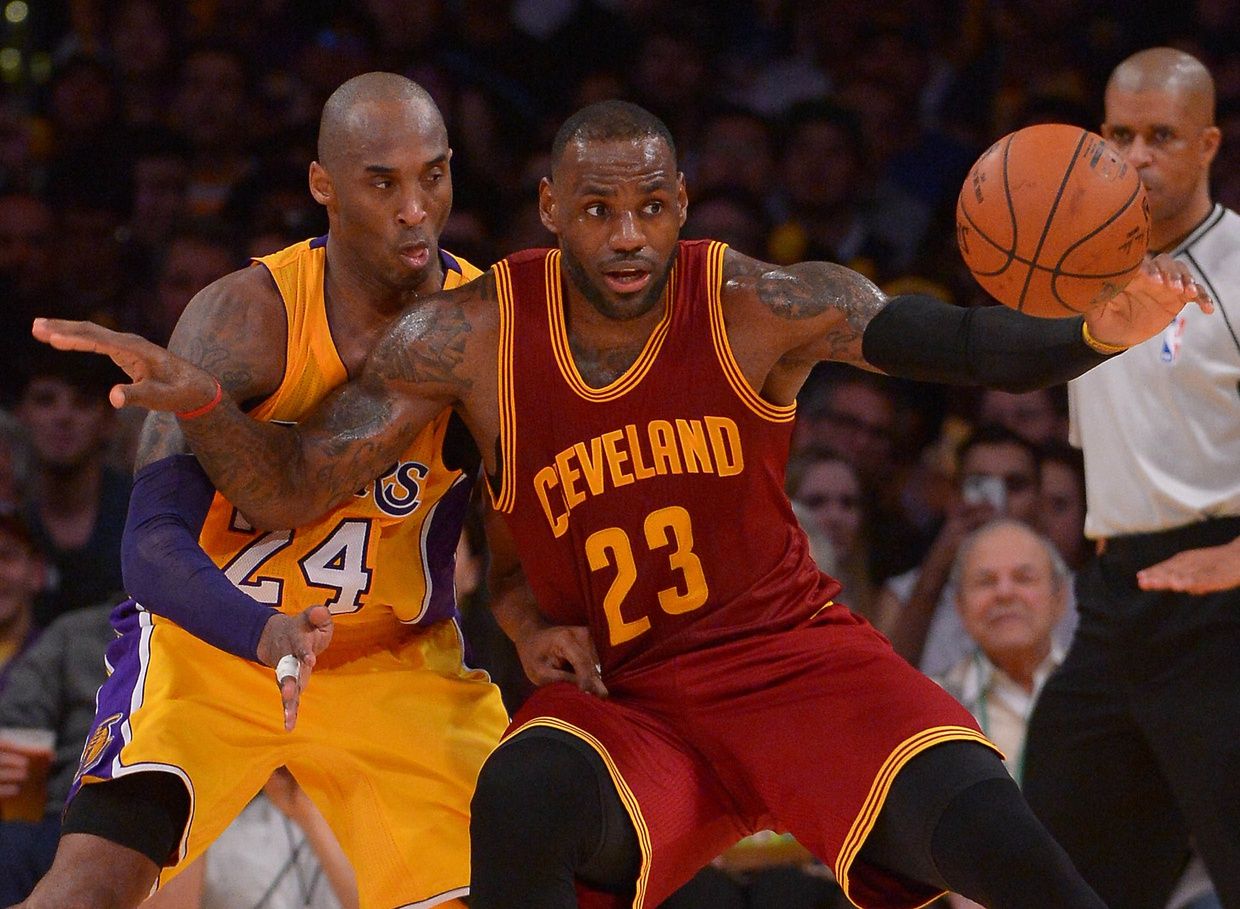 Los Angeles Lakers forward Kobe Bryant (24) guards Cleveland Cavaliers forward LeBron James (23) on the court in the first half of the game at Staples Center.