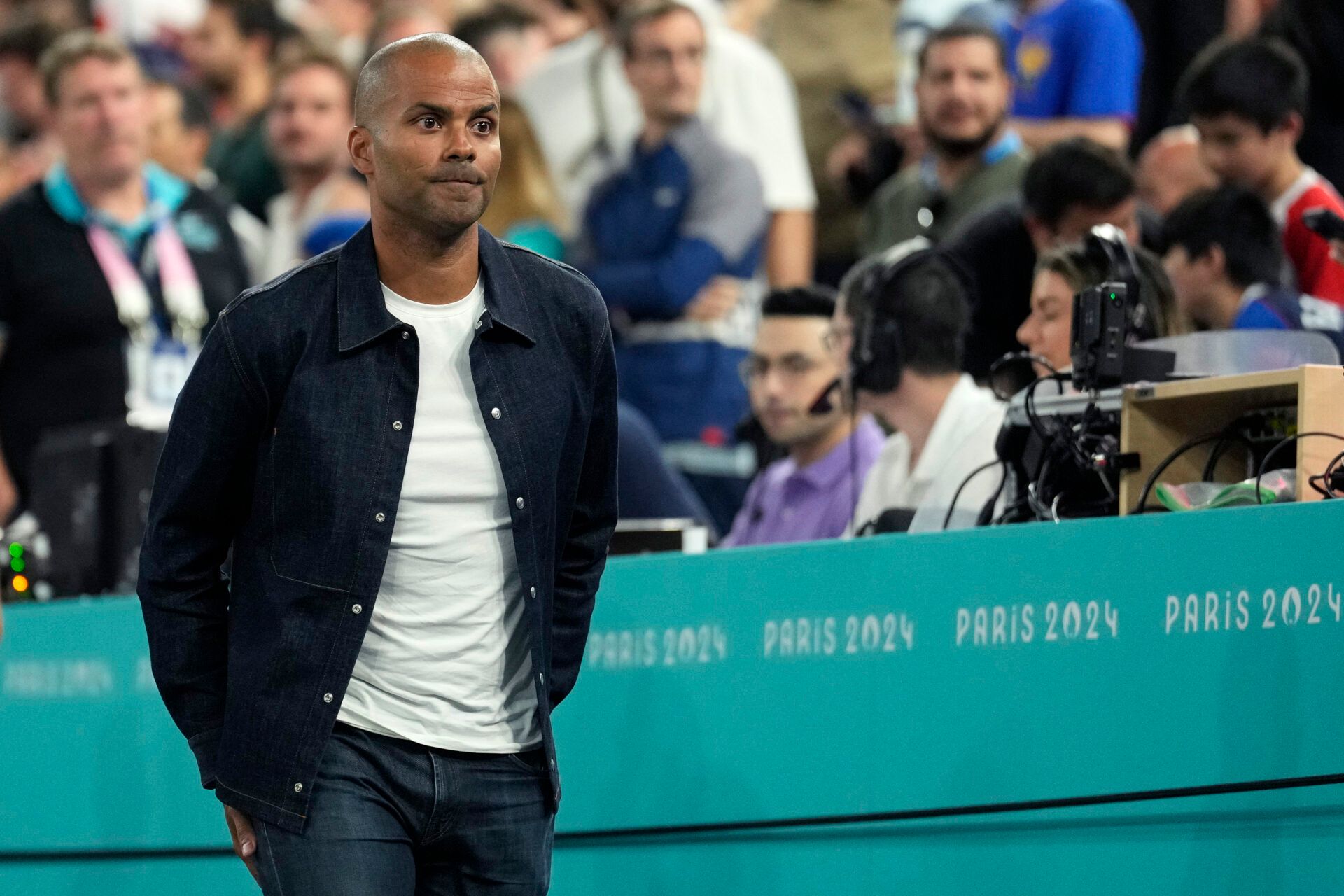 Former NBA player Tony Parker looks on during the first half between France and Germany in a men's basketball semifinal game during the Paris 2024 Olympic Summer Games at Accor Arena.