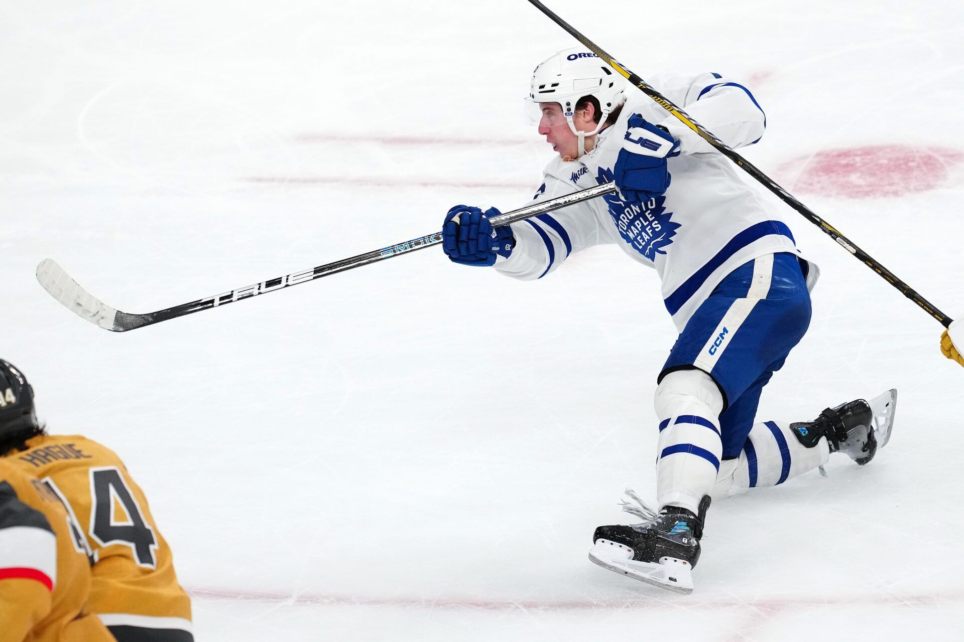 Toronto Maple Leafs right wing Mitch Marner (16) shoots against the Vegas Golden Knights during the third period at T-Mobile Arena.