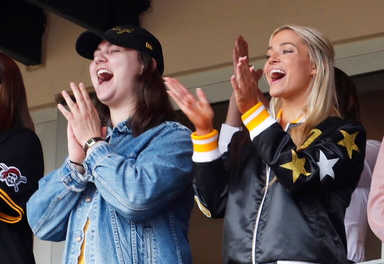 Louisiana State University gymnast Olivia Dunn (right) cheers as her boyfriend Pittsburgh Pirates starting pitcher Paul Skenes (not pictured) records a strikeout in his major league debut against the Chicago Cubs during the fourth inning at PNC Park.