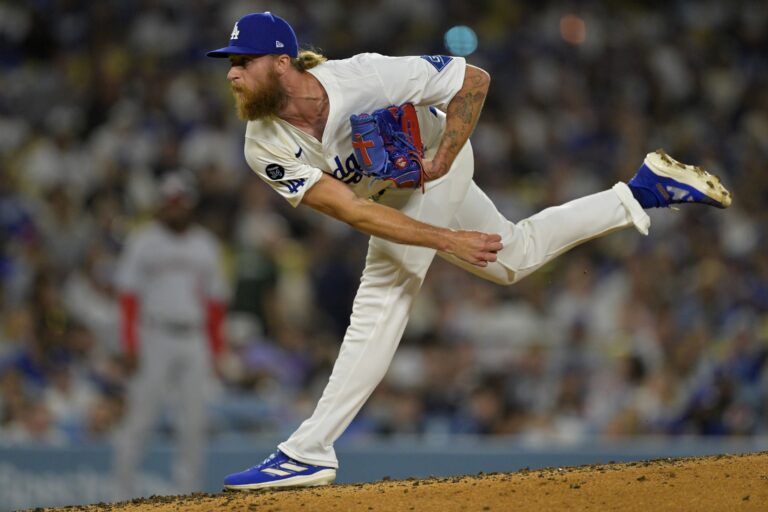 Los Angeles Dodgers relief pitcher Michael Kopech (45) delivers to the plate in the seventh inning against the Washington Nationals at Dodger Stadium.
