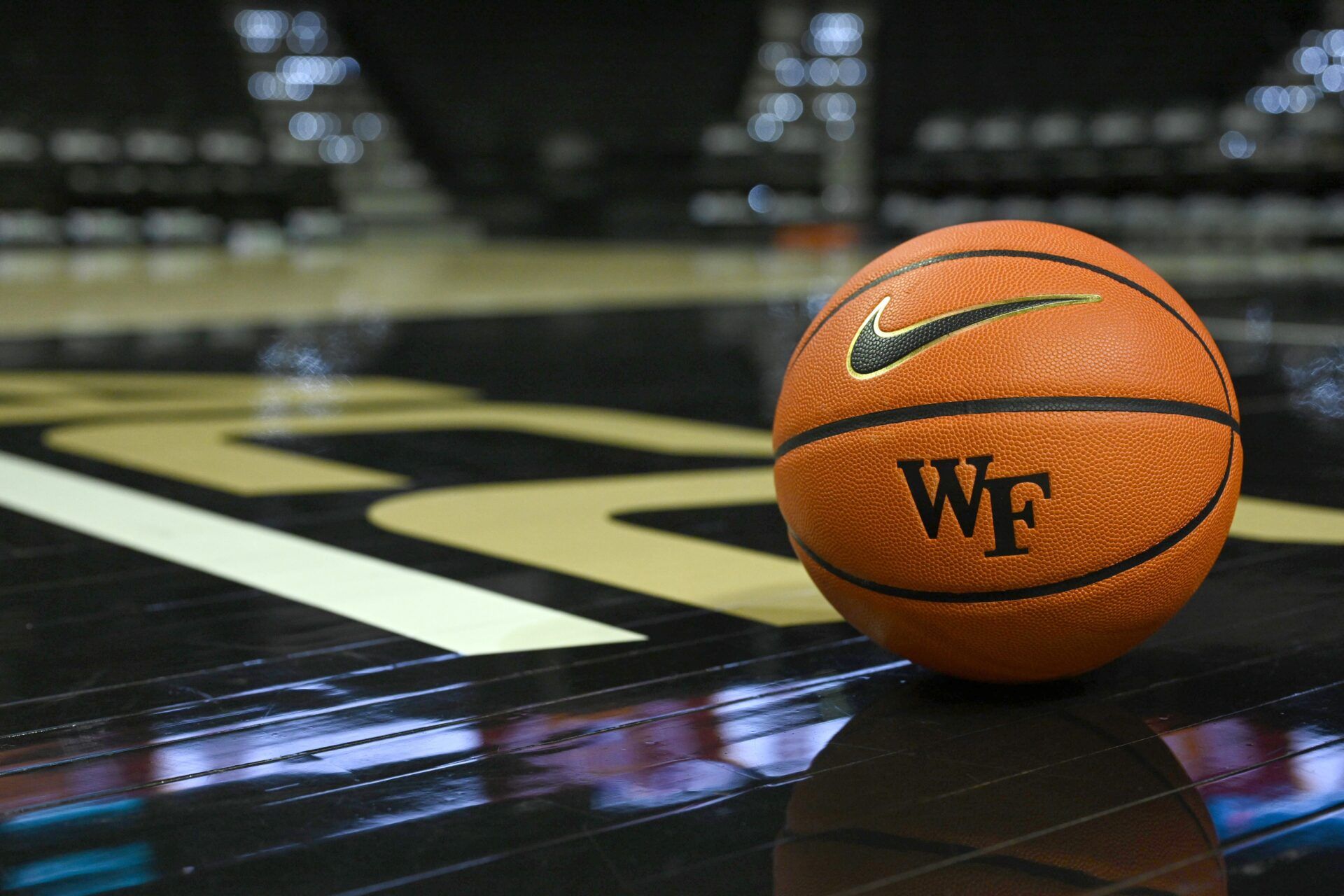 A general view of a Wake Forest Demon Deacons basketball in front of the ACC floor logo prior to the first half at Lawrence Joel Veterans Memorial Coliseum.