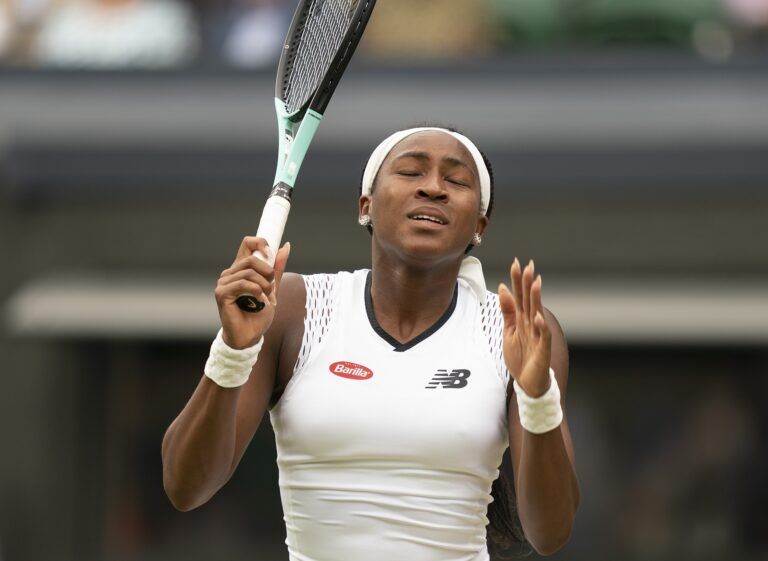 Coco Gauff (USA) reacts to a point during her match against Amanda Anisimova (USA) on day six at All England Lawn Tennis and Croquet Club.