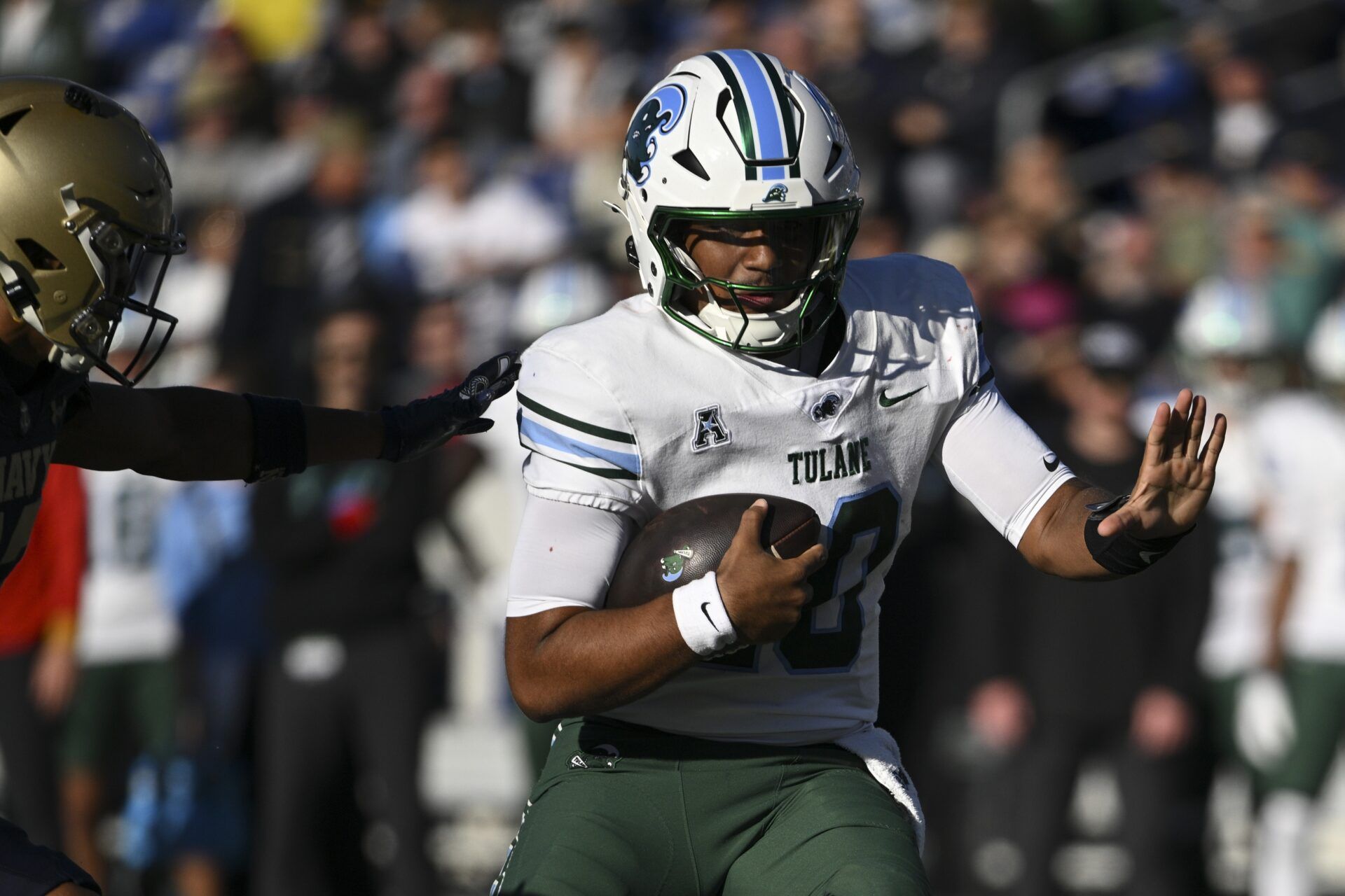 Tulane Green Wave quarterback Darian Mensah (10) rusheds during the second half against the Navy Midshipmen at Navy-Marine Corps Memorial Stadium.