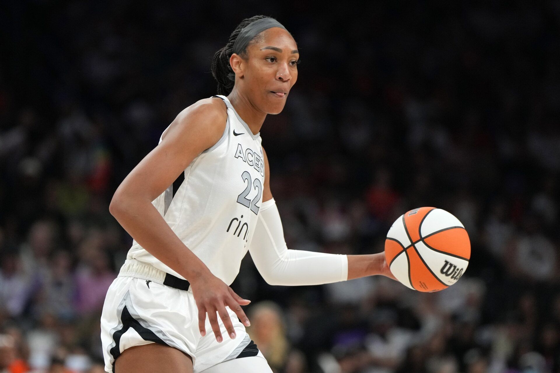 Las Vegas Aces center A'ja Wilson (22) drives against the Phoenix Mercury in the first half at Footprint Center.