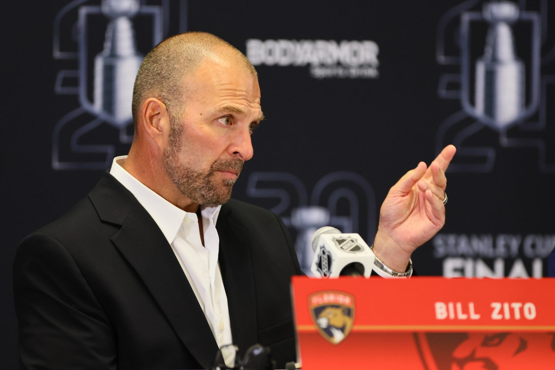 Florida Panthers general manager Bill Zito speaks to reporters during media day in advance of the 2024 Stanley Cup Final at Amerant Bank Arena.
