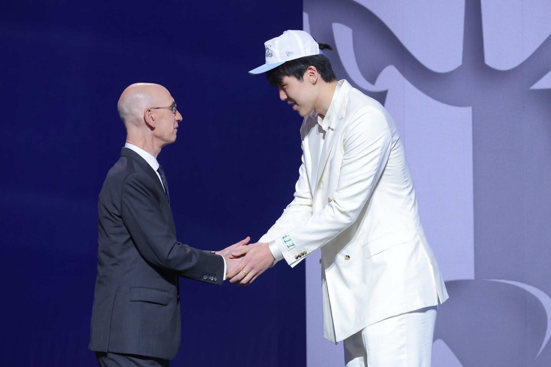 Yang Hansen greets NBA commissioner Adam Silver after being selected as the 16th pick by the Memphis Grizzlies in the first round of the 2025 NBA Draft at Barclays Center.