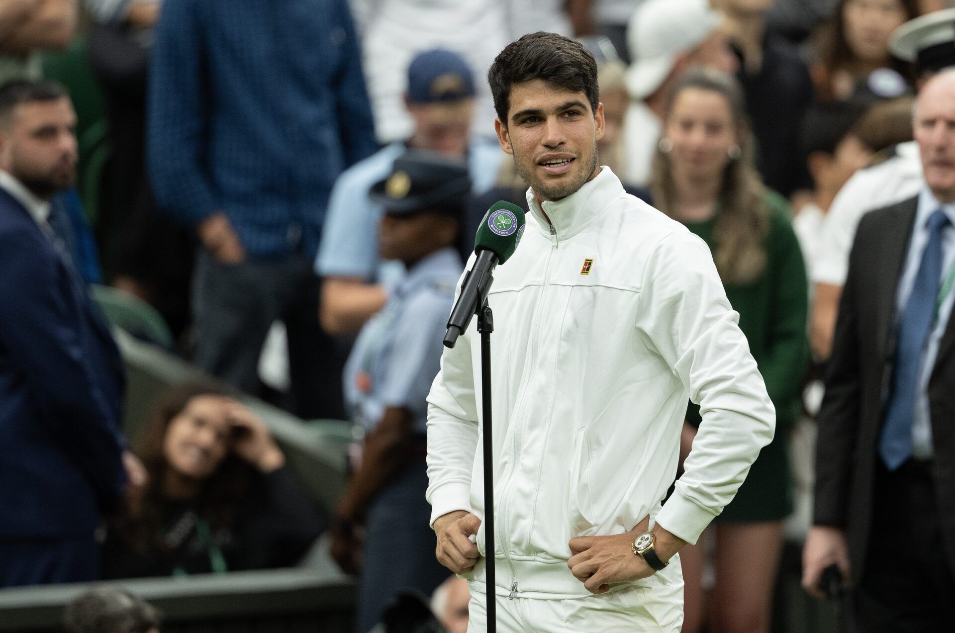 Carlos Alcaraz of Spain is interviewed on the court after winning his match against Frances Tiafoe of the United States (not shown) on day five of The Championships at All England Lawn Tennis and Croquet Club.