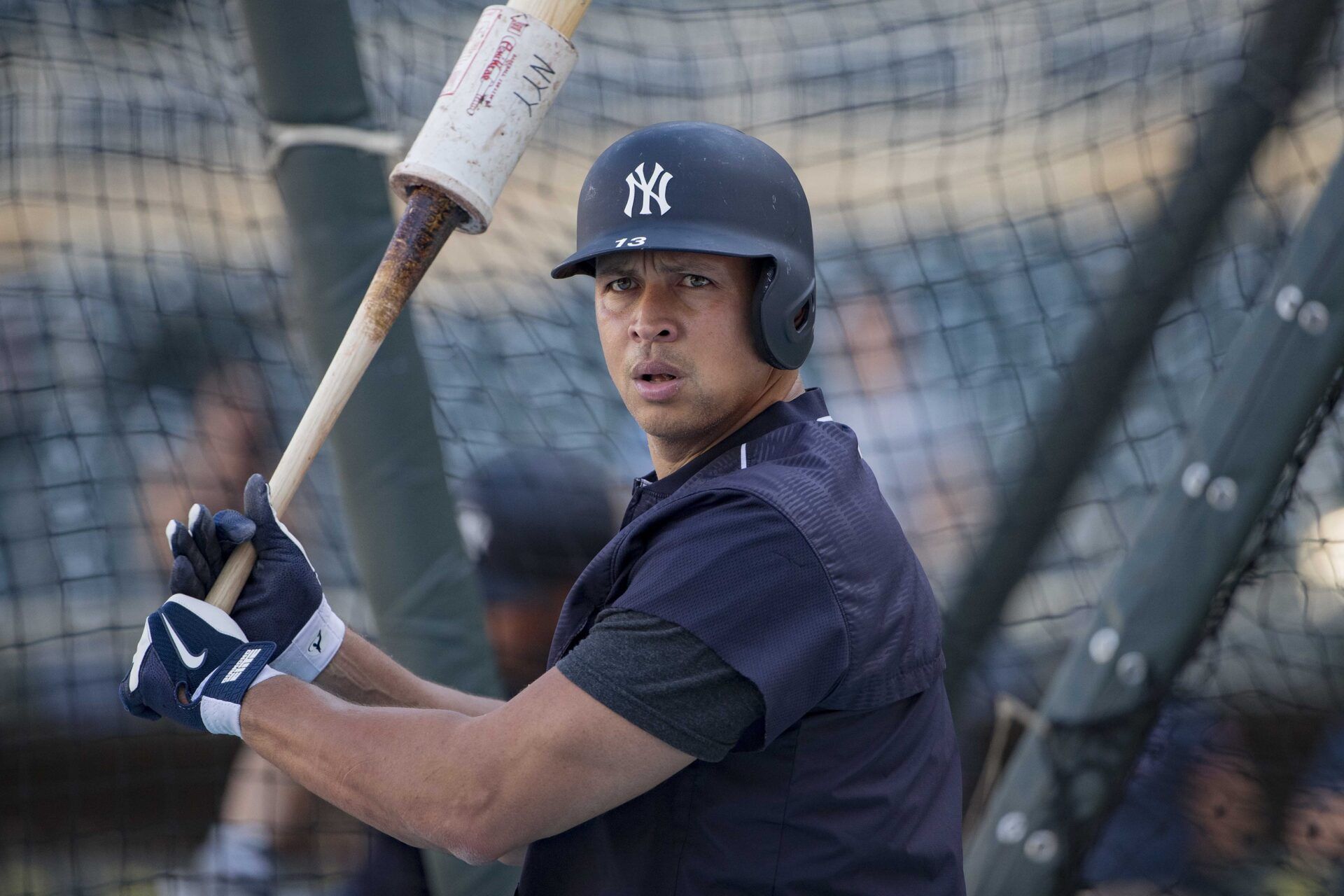 New York Yankees designated hitter Alex Rodriguez (13) warms up during pre game batting practice before a game against the Minnesota Twins at Target Field.
