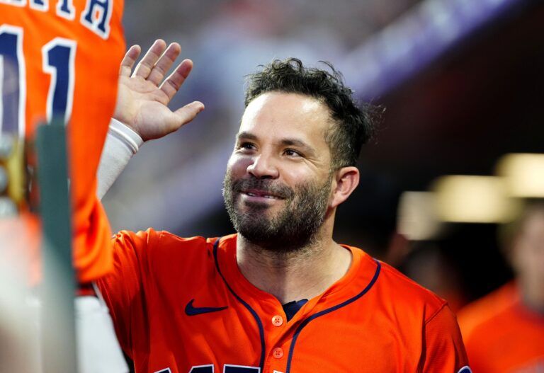 Houston Astros second baseman Jose Altuve (27) reacts in the sixth inning against the Colorado Rockies at Coors Field.