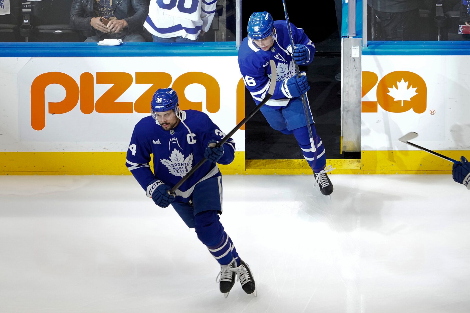 Toronto Maple Leafs forward Auston Matthews (34) and forward Mitch Marner (16) take to the ice for warm up before game seven of the second round of the 2025 Stanley Cup Playoffs against the Florida Panthers at Scotiabank Arena.