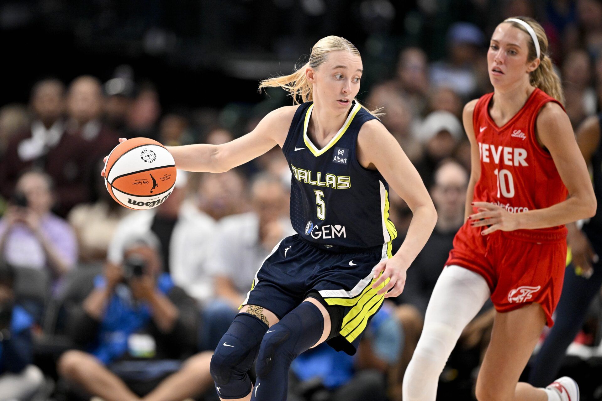 Indiana Fever guard Lexie Hull (10) and Dallas Wings guard Paige Bueckers (5) in action during the game between the Dallas Wings and the Indiana Fever at the American Airlines Center.