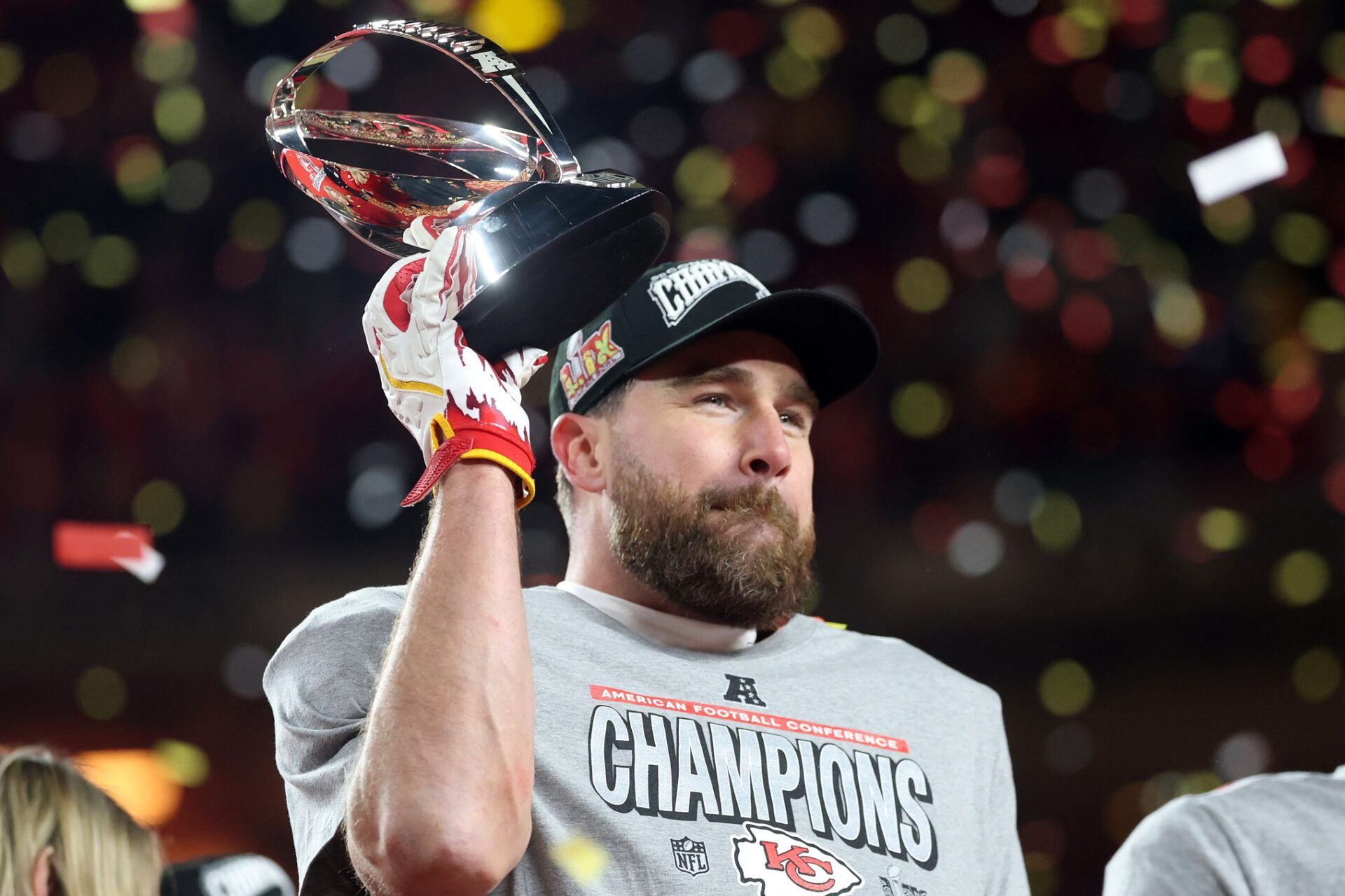 Kansas City Chiefs tight end Travis Kelce (87) reacts on stage after the AFC Championship game against the Buffalo Bills at GEHA Field at Arrowhead Stadium.