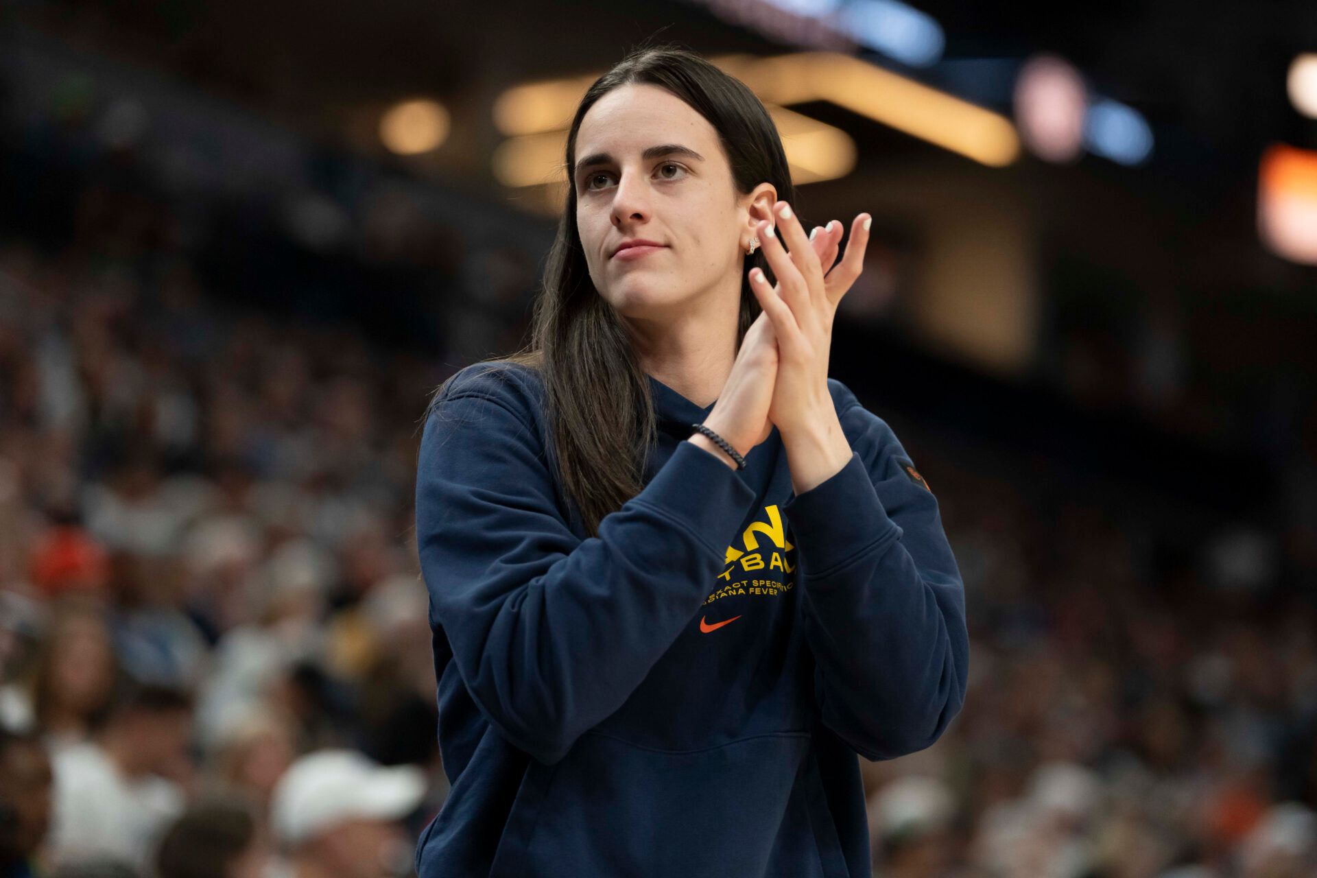 Indiana Fever guard Caitlin Clark (22) looks on against the Minnesota Lynx in the second half during the Commissioner's Cup final at Target Center.