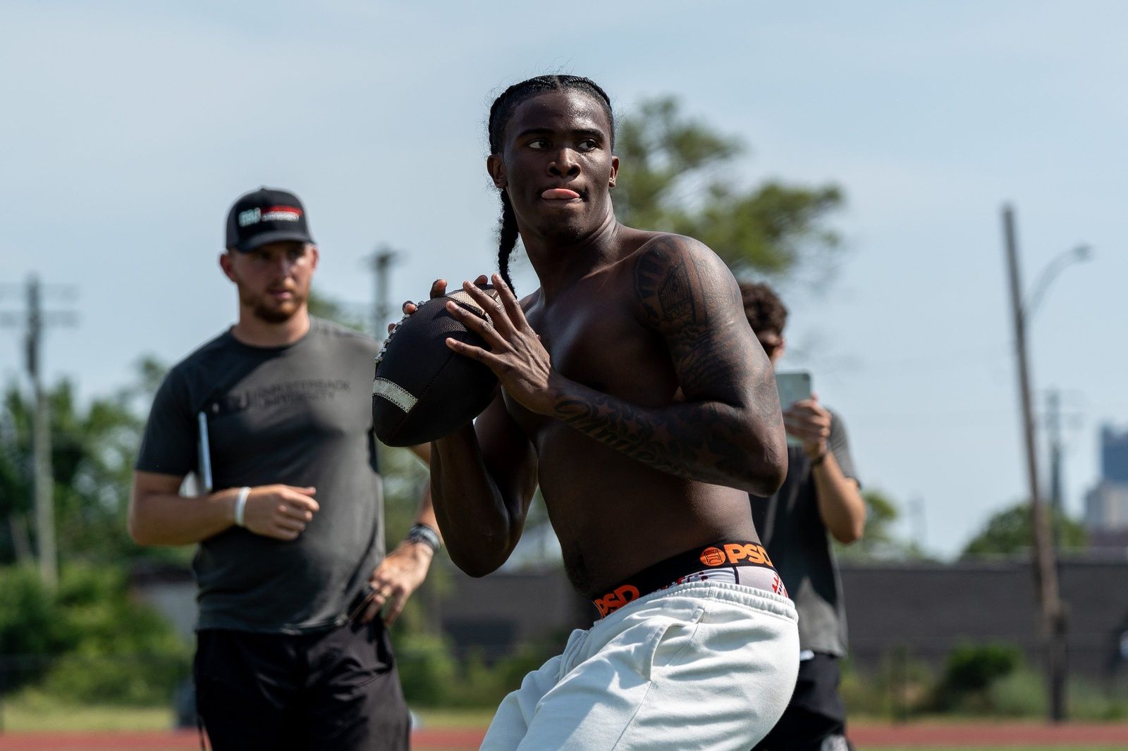 Bryce Underwood, 17, a freshman quarterback at the University of Michigan and the nation’s No. 1 recruit in the 2025 class, participates in a football drill during a private workout in Detroit on Saturday, June 21, 2025.
