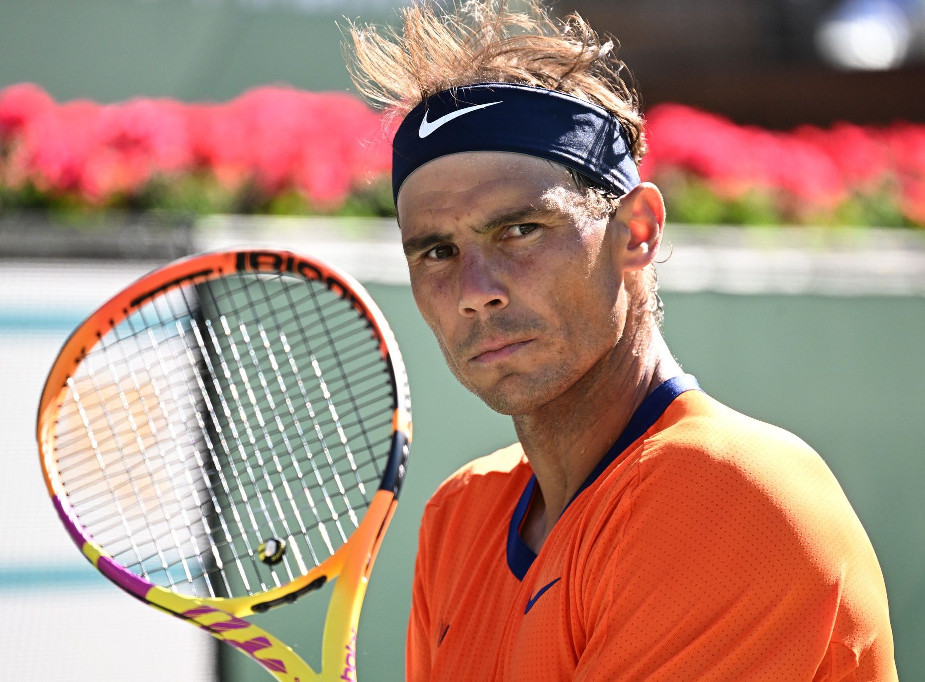 Rafael Nadal (ESP) looks on during a break in his quarterfinal match as he defeated Nick Kyrgios (AUS) at the BNP Paribas Open at the Indian Wells Tennis Garden.
