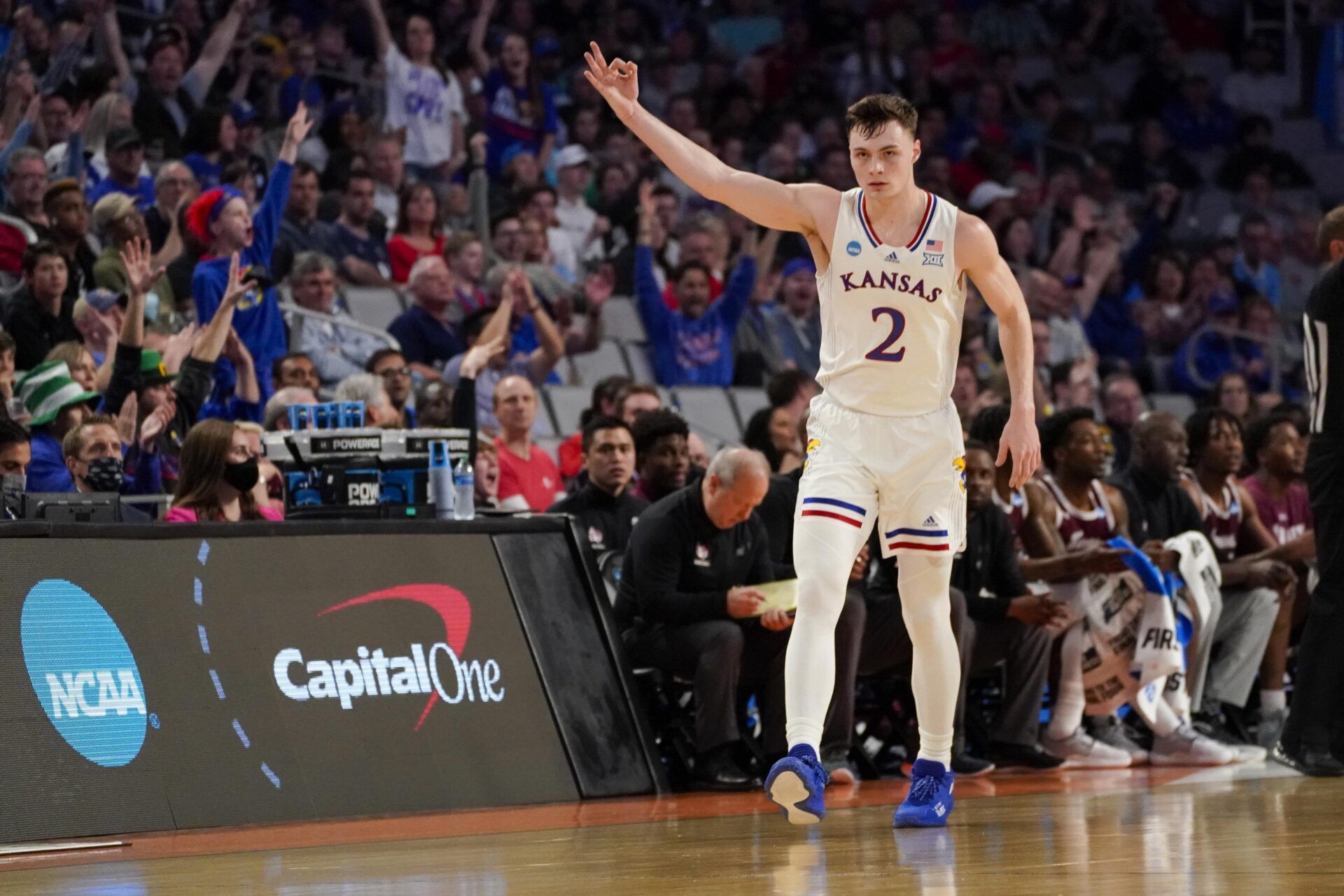 Kansas Jayhawks guard Christian Braun (2) celebrates making a three point shot against the Texas Southern Tigers during the first half in the first round of the 2022 NCAA Tournament at Dickies Arena.