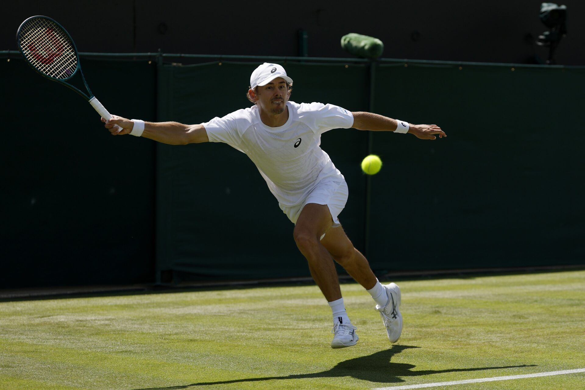 Alex de Minaur (AUS) reaches for a forehand against Arthur Cazaux (FRA)(not pictured) on day four of The Championships Wimbledon 2025 at All England Lawn Tennis and Croquet Club.