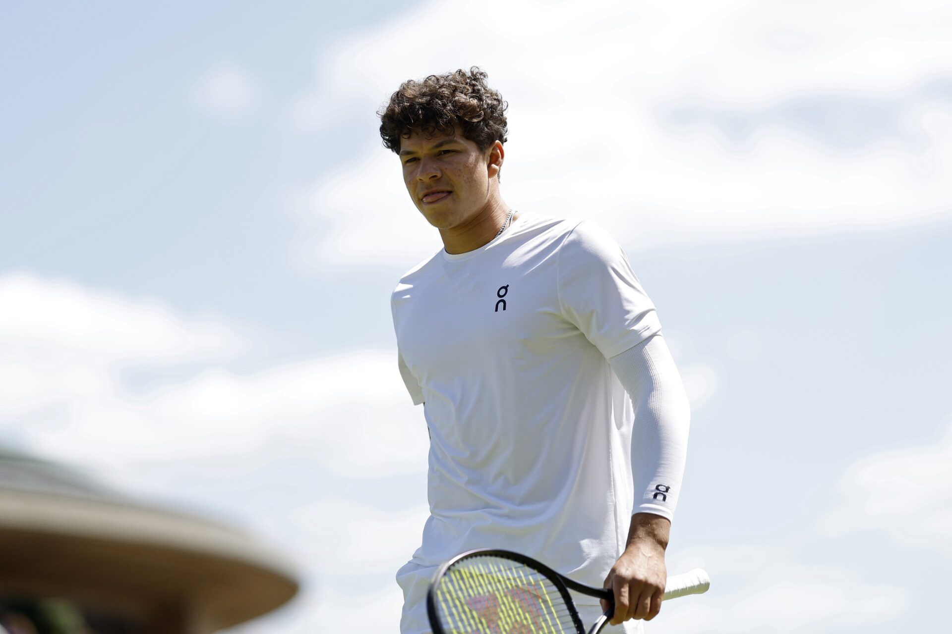Ben Shelton (USA) stands on the court during warmup prior to his match against Lloyd Harris (RSA)(not pictured) in gentlemen's singles on day four of The Championships Wimbledon 2024 at All England Lawn Tennis and Croquet Club.