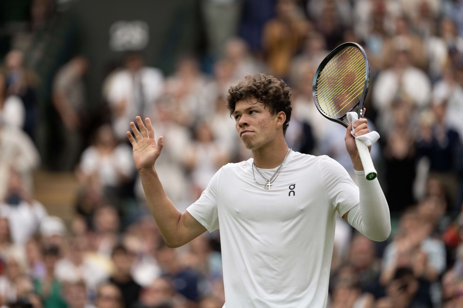Ben Shelton of the United States gestures after a shot during his match against Denis Shapovalov (not shown) of Canada on day six of The Championships at All England Lawn Tennis and Croquet Club.