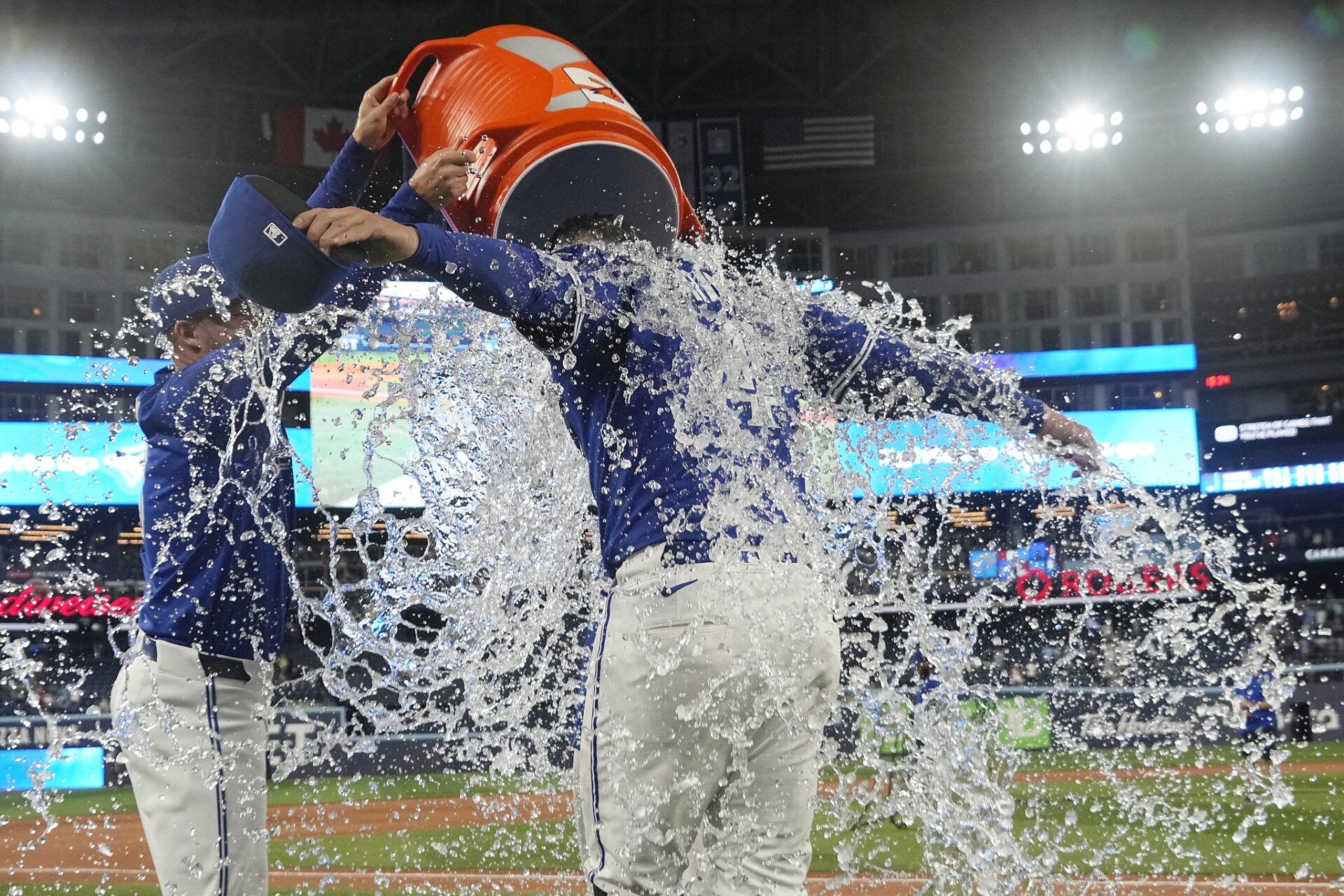 Toronto Blue Jays designated hitter George Springer (4) gets doused with ice water following a win over the New York Yankees at Rogers Centre.