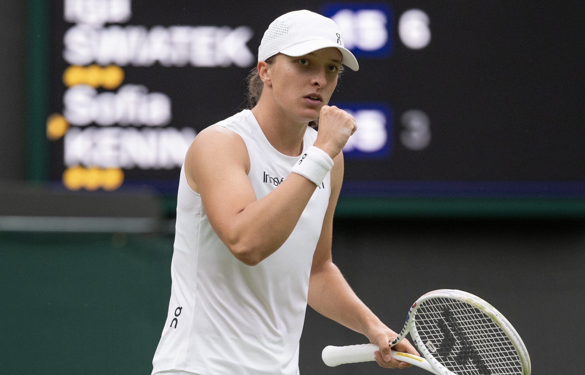 Iga Swiatek of Poland reacts to a point during her match against Sofia Kenin of the United States on day two of The Championships at All England Lawn Tennis and Croquet Club.