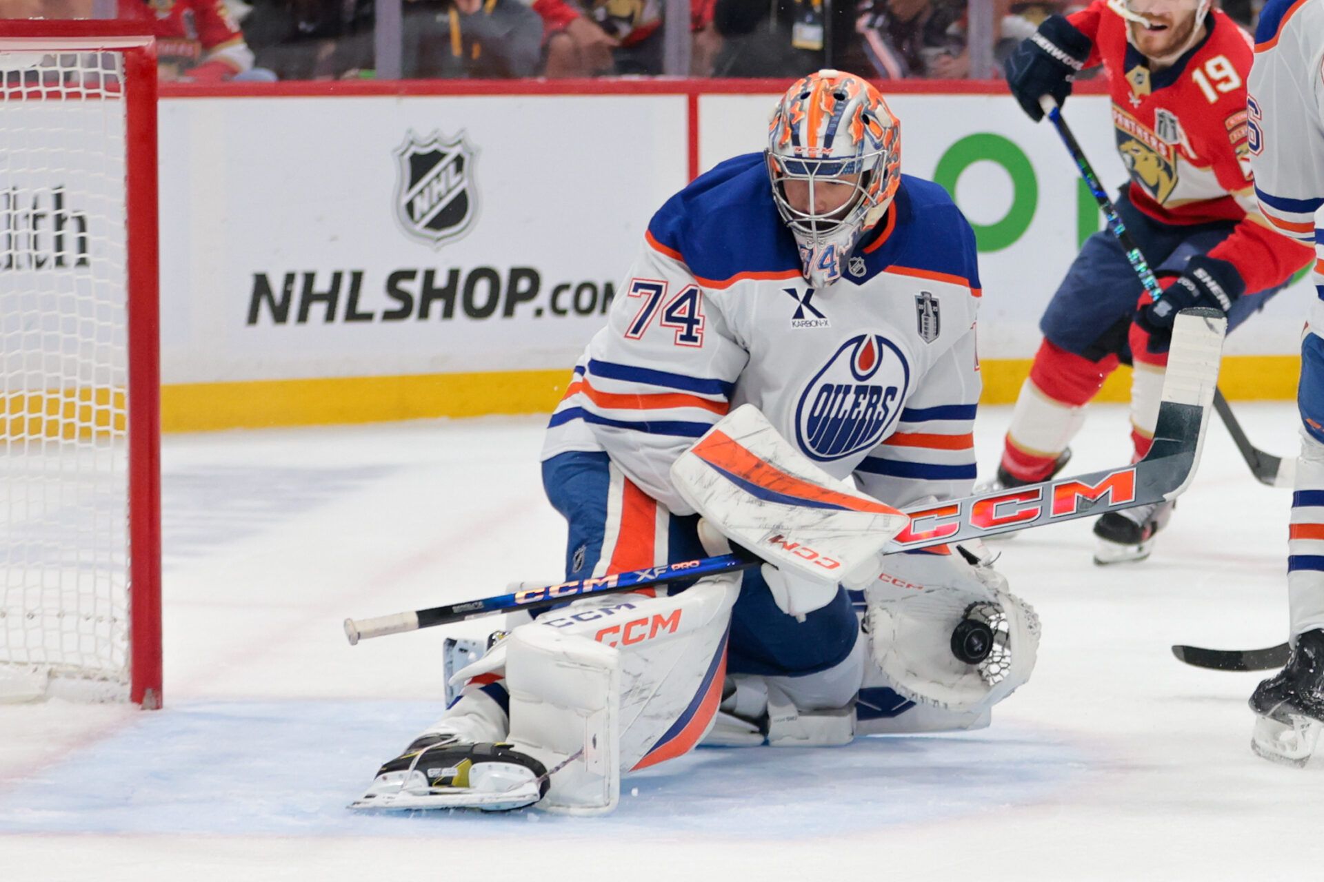 Edmonton Oilers goaltender Stuart Skinner (74) makes a glove save against the Florida Panthers during the second period in game six of the 2025 Stanley Cup Final at Amerant Bank Arena.