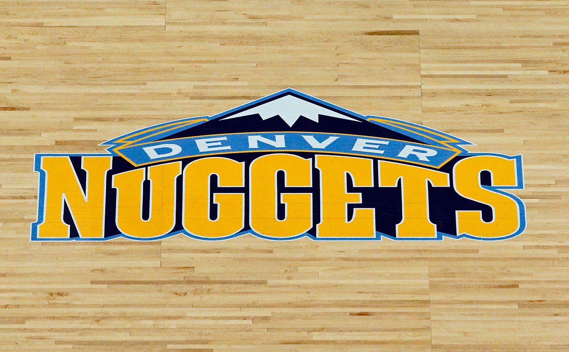 A view of the Denver Nuggets logo on the court prior to the game against the Milwaukee Bucks at the Pepsi Center.