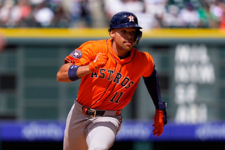 Houston Astros outfielder Cam Smith (11) runs off a two run triple in the seventh inning against the Colorado Rockies  at Coors Field.