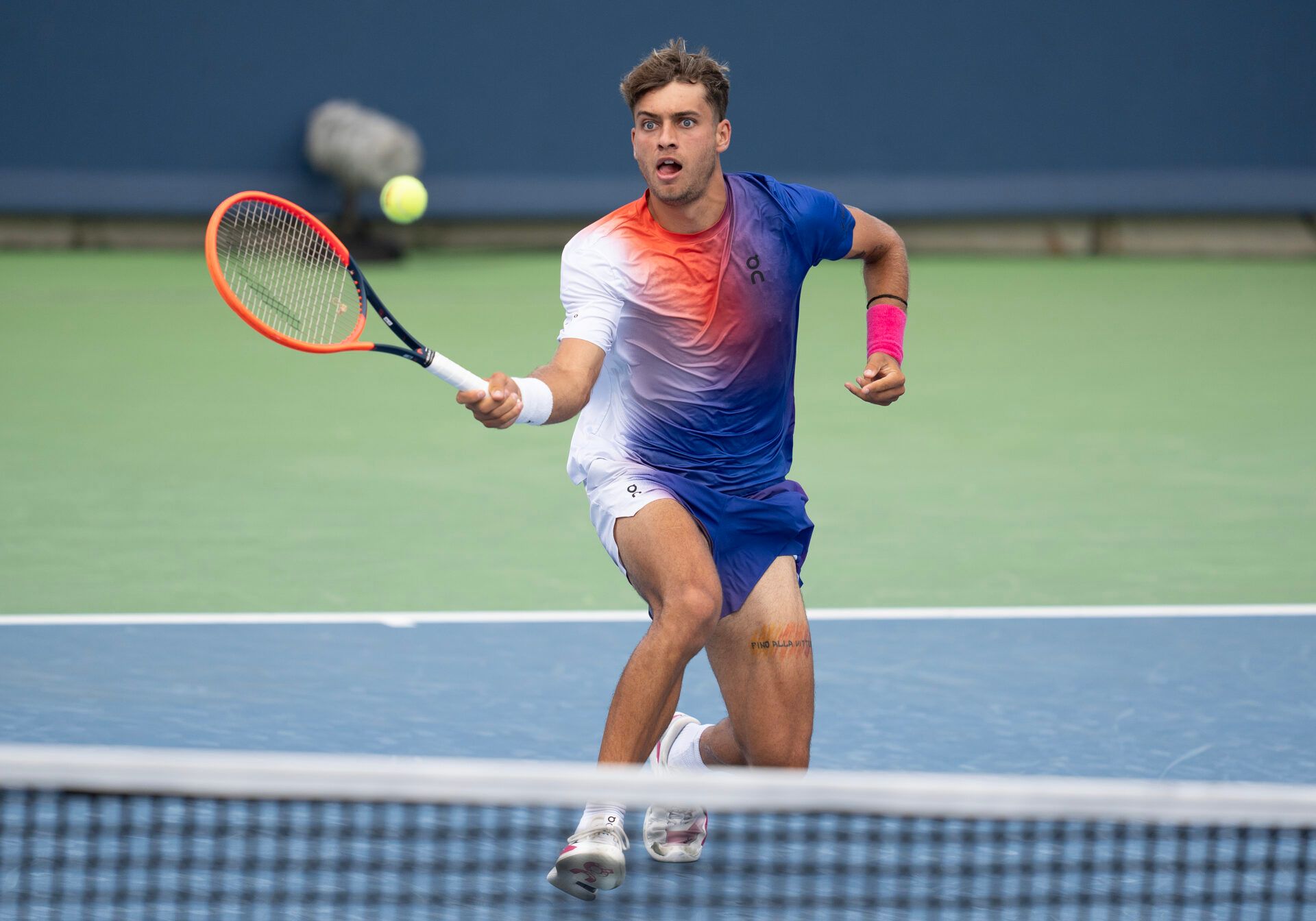Flavio Cobolli of Italy returns a shot during his match against Hubert Hurkacz of Poland on day five of the Cincinnati Open.