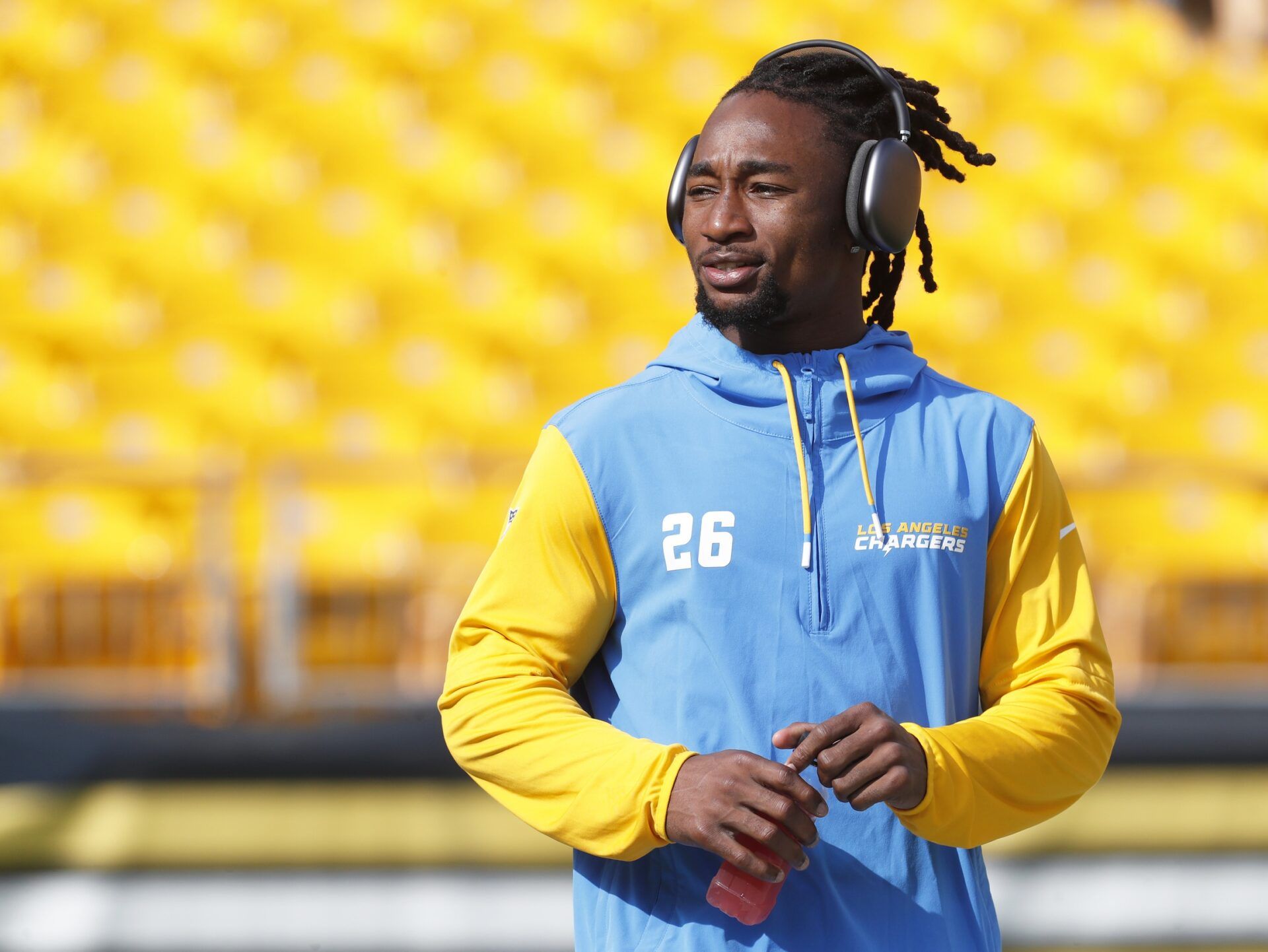 Los Angeles Chargers cornerback Asante Samuel Jr. (26) walks the field before playing the Pittsburgh Steelers at Acrisure Stadium.